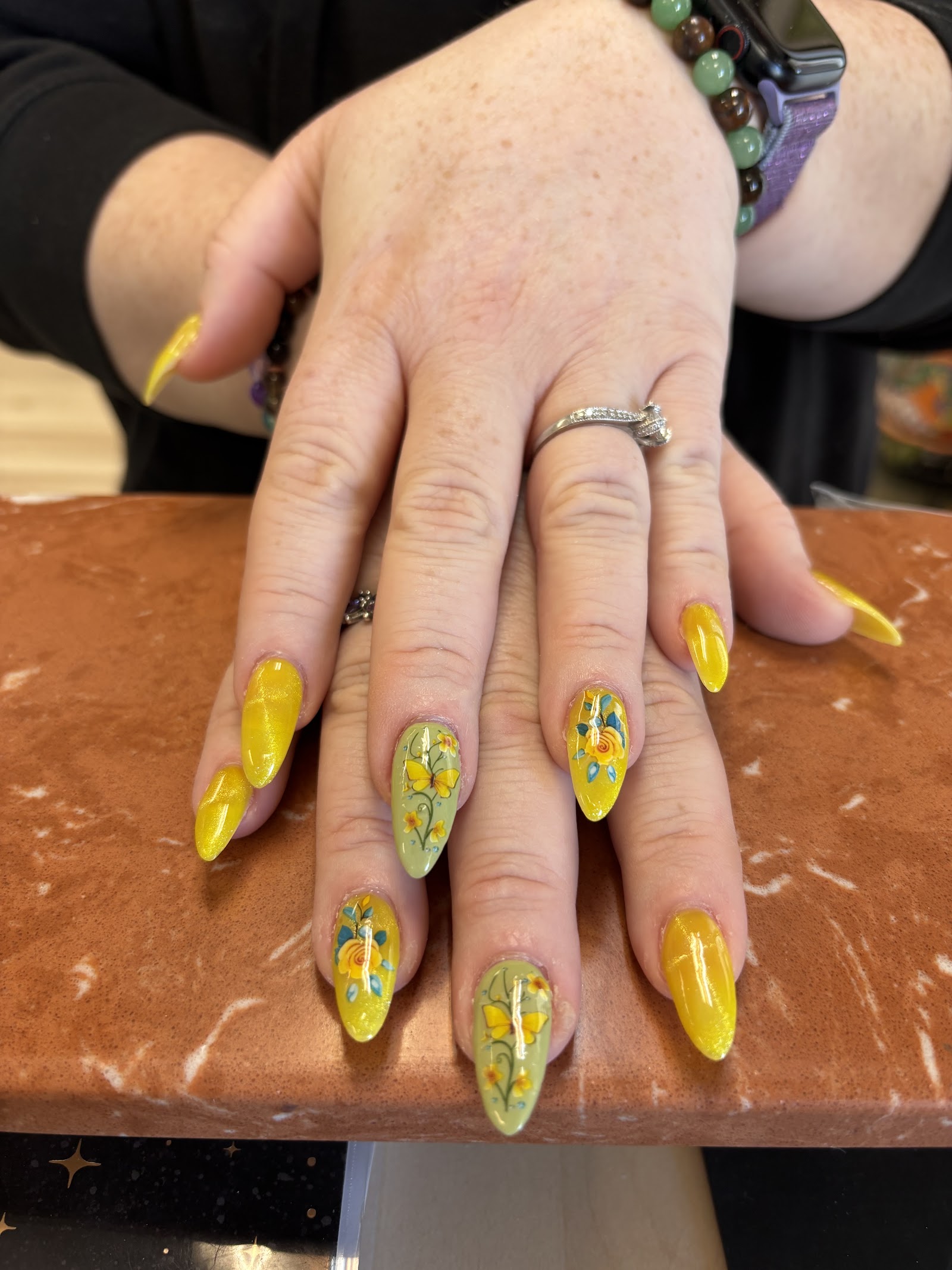 Yellow nails with hand-painted sunflowers